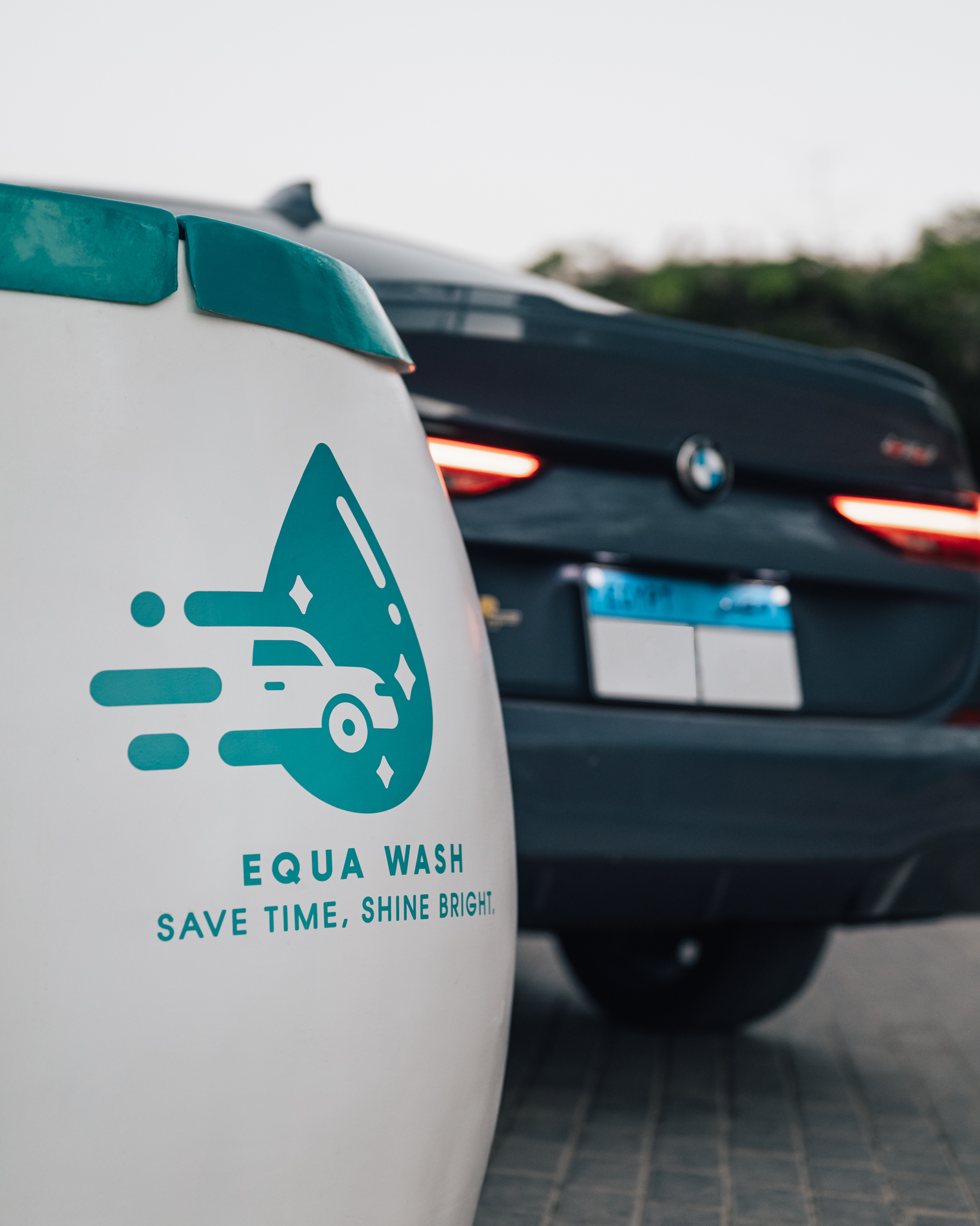 Equa Wash cart serving a car inside a residential compound